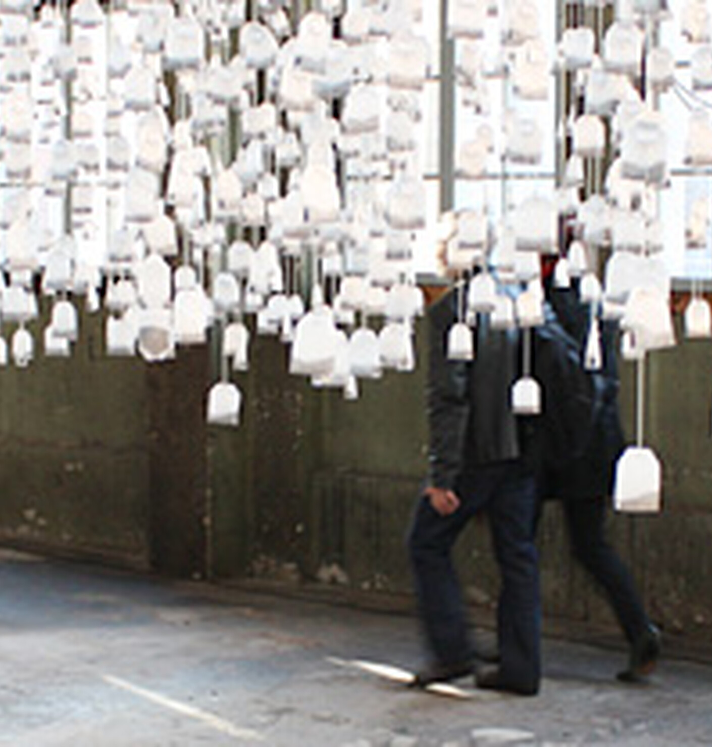 A lonely, backlit worker