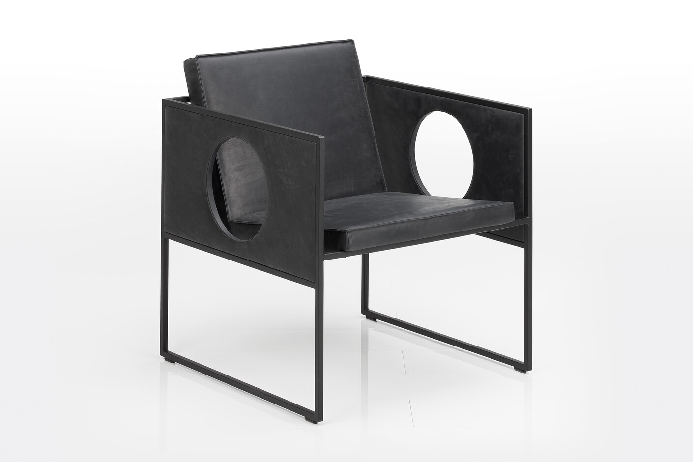 Grace armchair with cut-outs