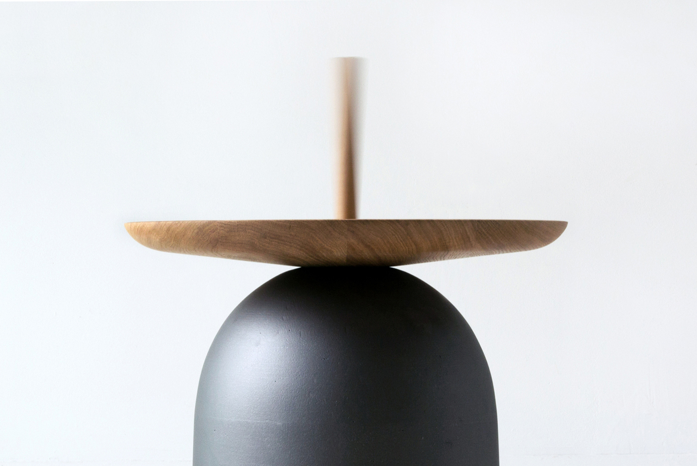 The side table "Campane" brings with the function of a bell rhythm in the room.