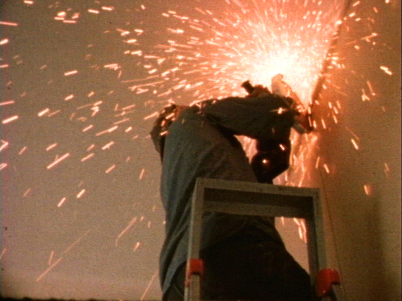 Film still from "Office Baroque", 1977. Matta Clark cut openings through all five storeys of an office building in Antwerp before its final demolition.