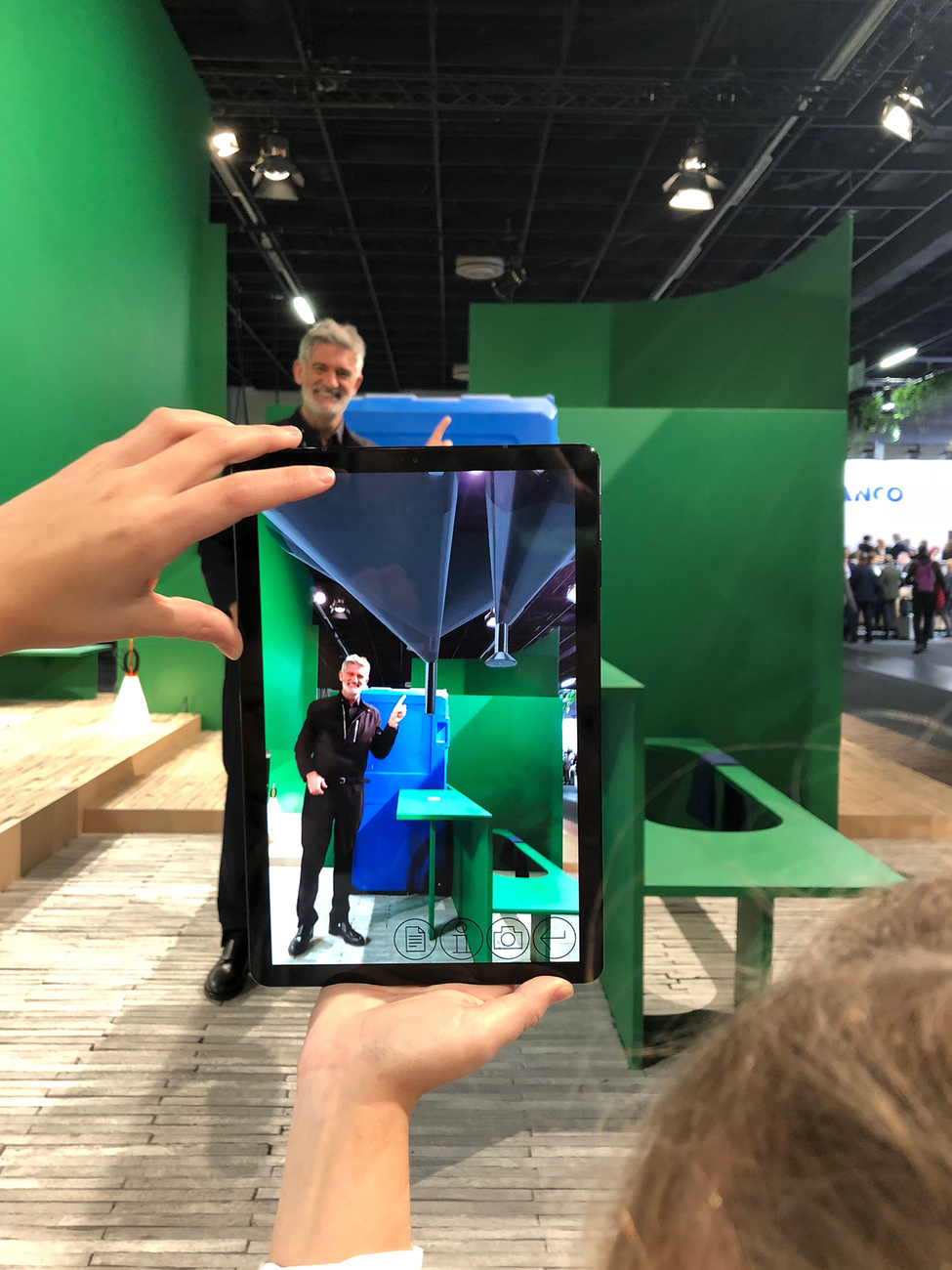 In the virtual world, Häberli stands under the filter system that purifies the rain into drinking and process water.