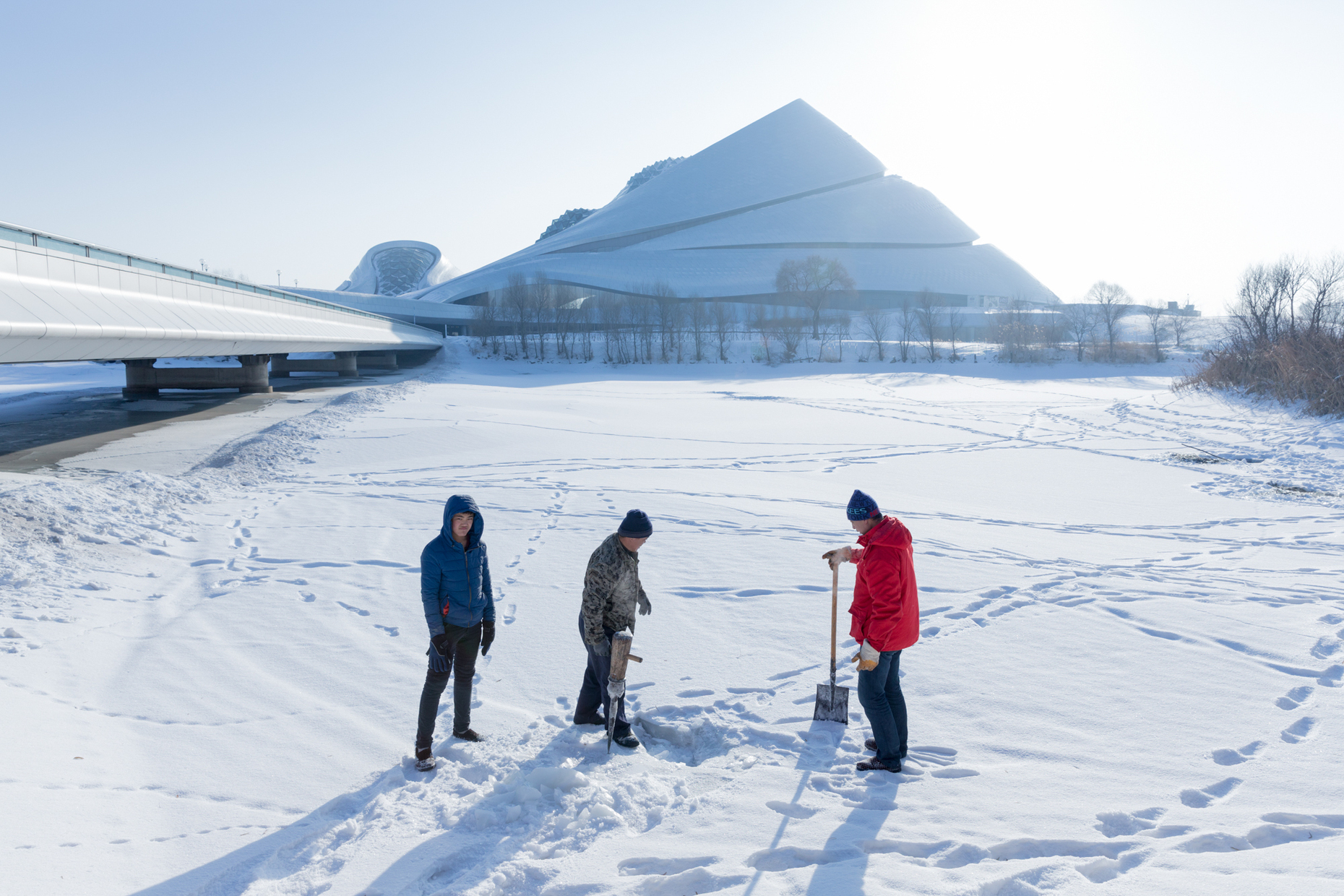 Harbin Opera House, Northern China, designed by MAD Architects, photo Iwan Baan, ice fishing in China
