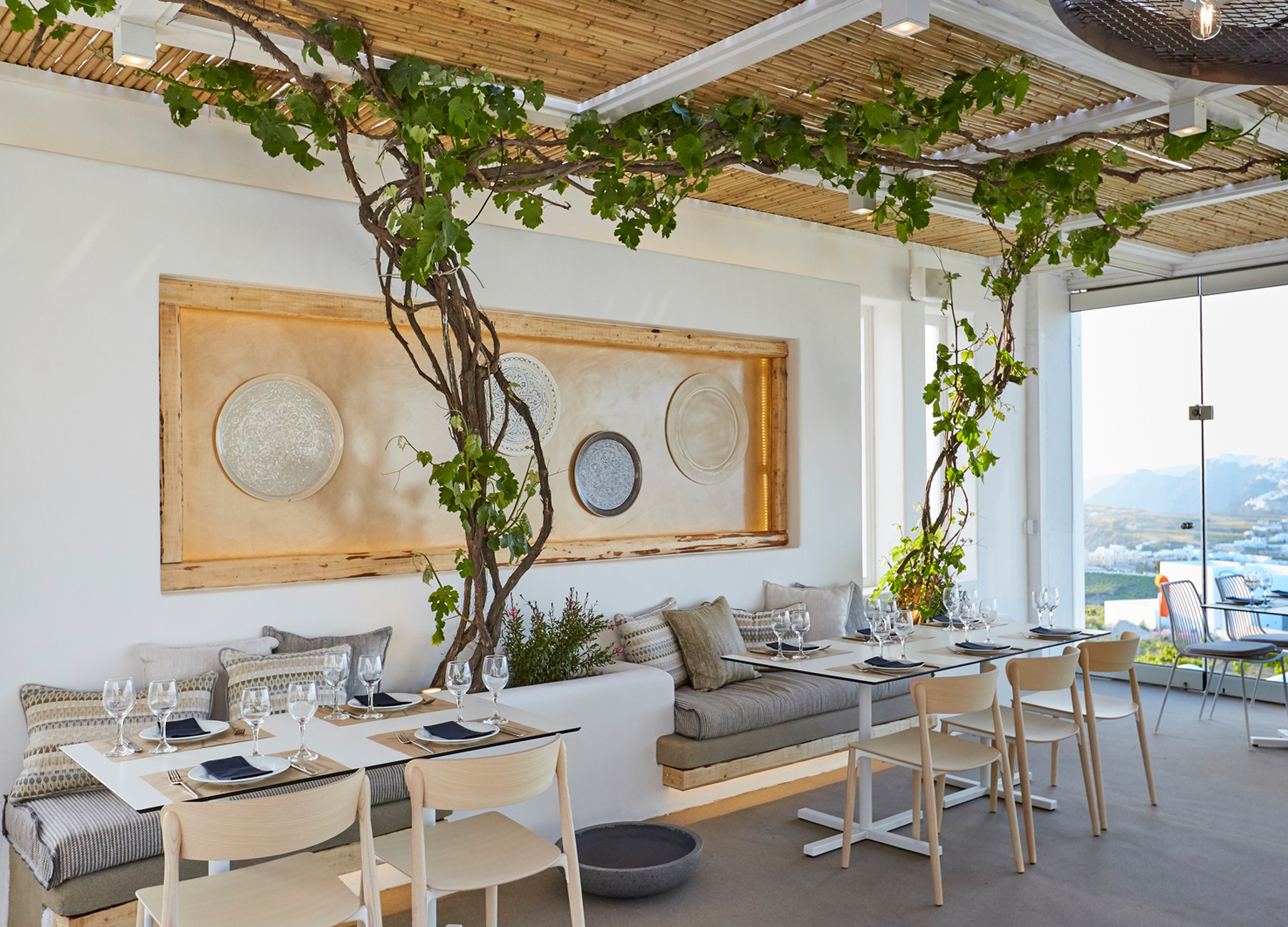 Meanwhile in the main restaurant guests are seated on “Nemea” chairs, shaped from solid ash in a traditional manufacturing process.