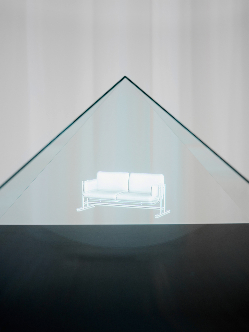 The extraordinary presentation by design studio Relvão Kellermann shows the 2018 winners as 3D holograms.