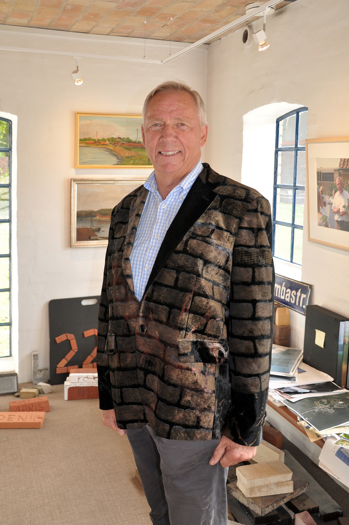 Not without my brick jacket: Christian Petersen knows how to present himself.