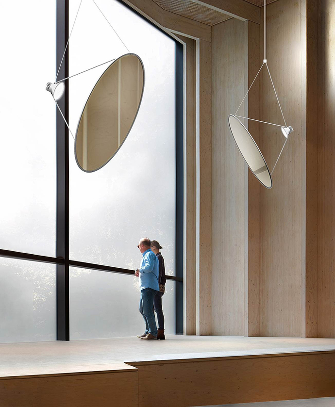 The "Amisol" luminaire by Daniel Rybakken for Luceplan. The idea is incredibly simple: An LED spot illuminates a circular sun sail, resulting in soft, diffuse light.