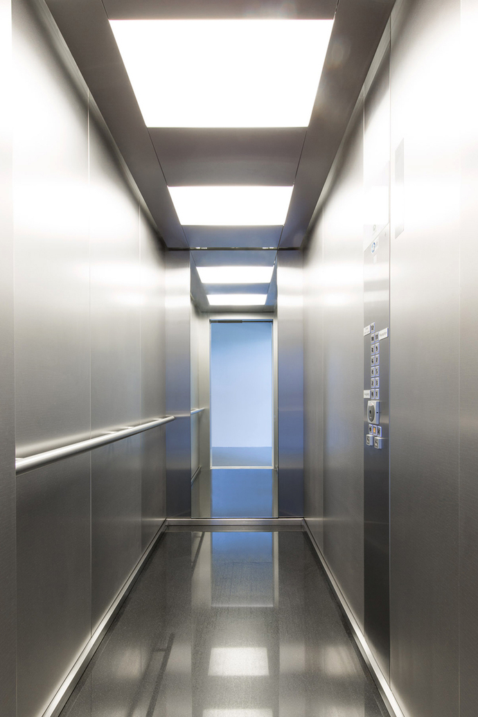 Aesthetic view: The interior of the elevator, which is held in stainless steel, is set in scene with a futuristic ceiling design and LED lighting.