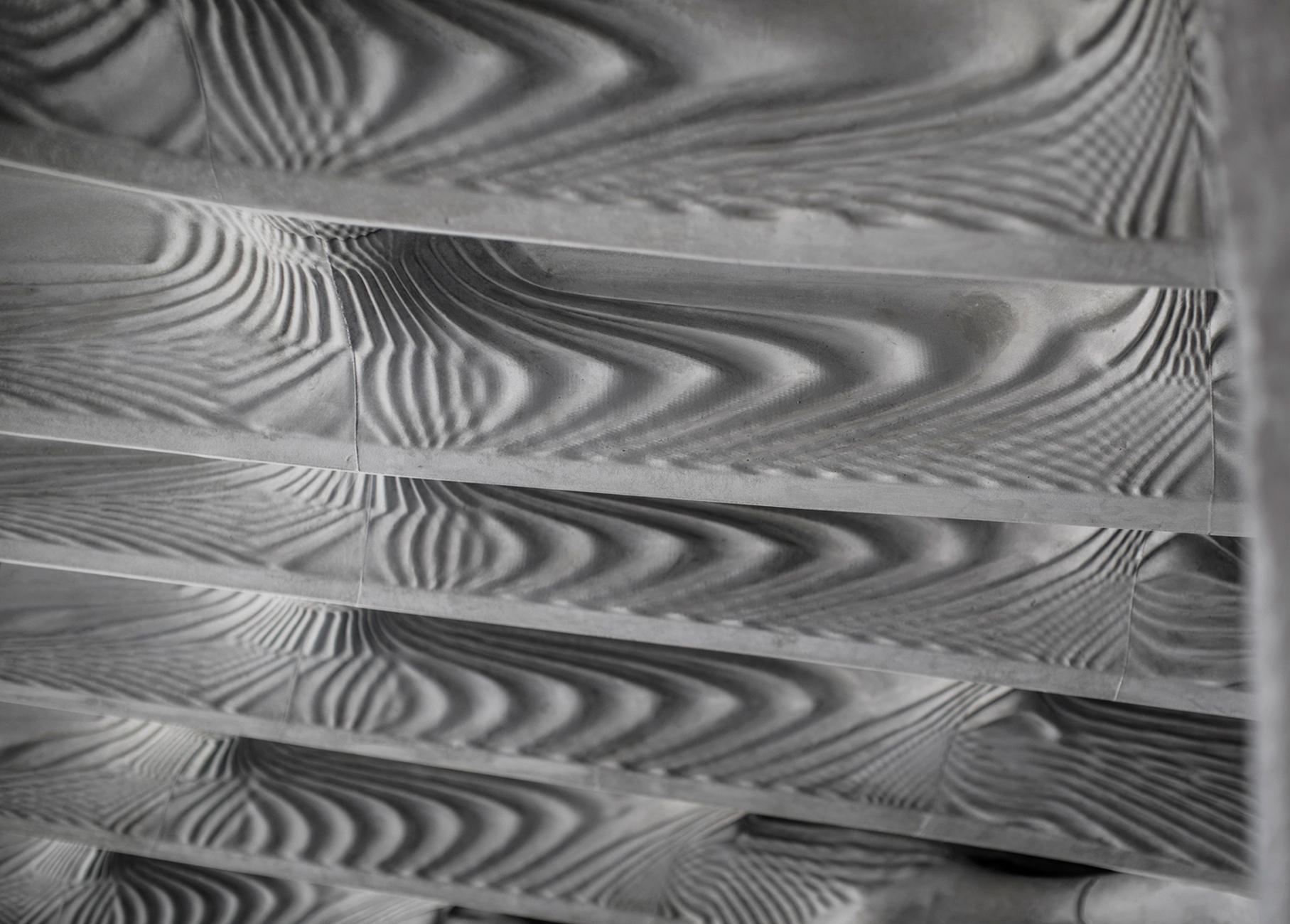 The principal ribs of the Smart Slab, differentiated through unique articulated surfaces, which show-case the free-form capabilities of concrete.