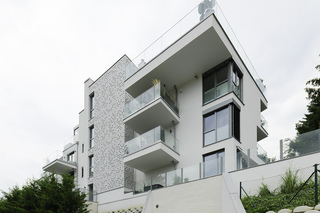 concrete skin, Residential Building Scheimpfluggasse  by  Rieder