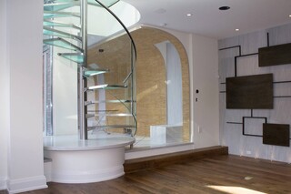 Glass spiral stairs  by  EeStairs